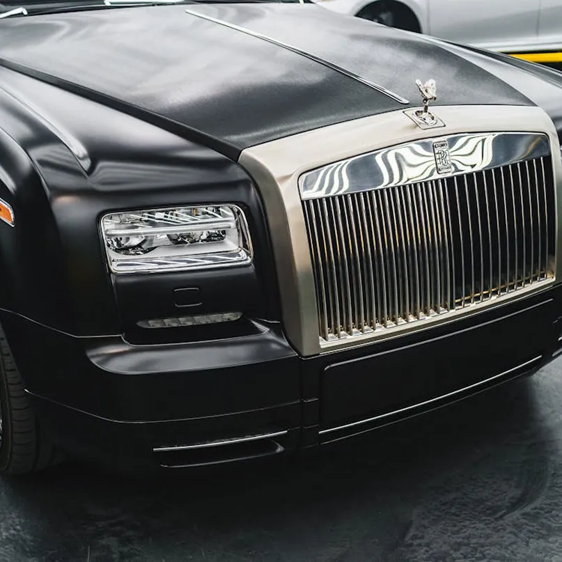 Front grille and Spirit of Ecstasy of a matte black Rolls-Royce